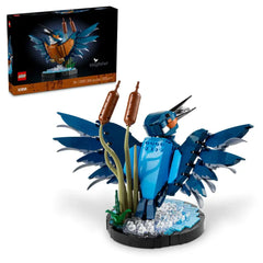 LEGO® Icons Kingfisher Bird set, featuring a vibrant blue kingfisher with wings spread wide, positioned by a water setting with cattails.