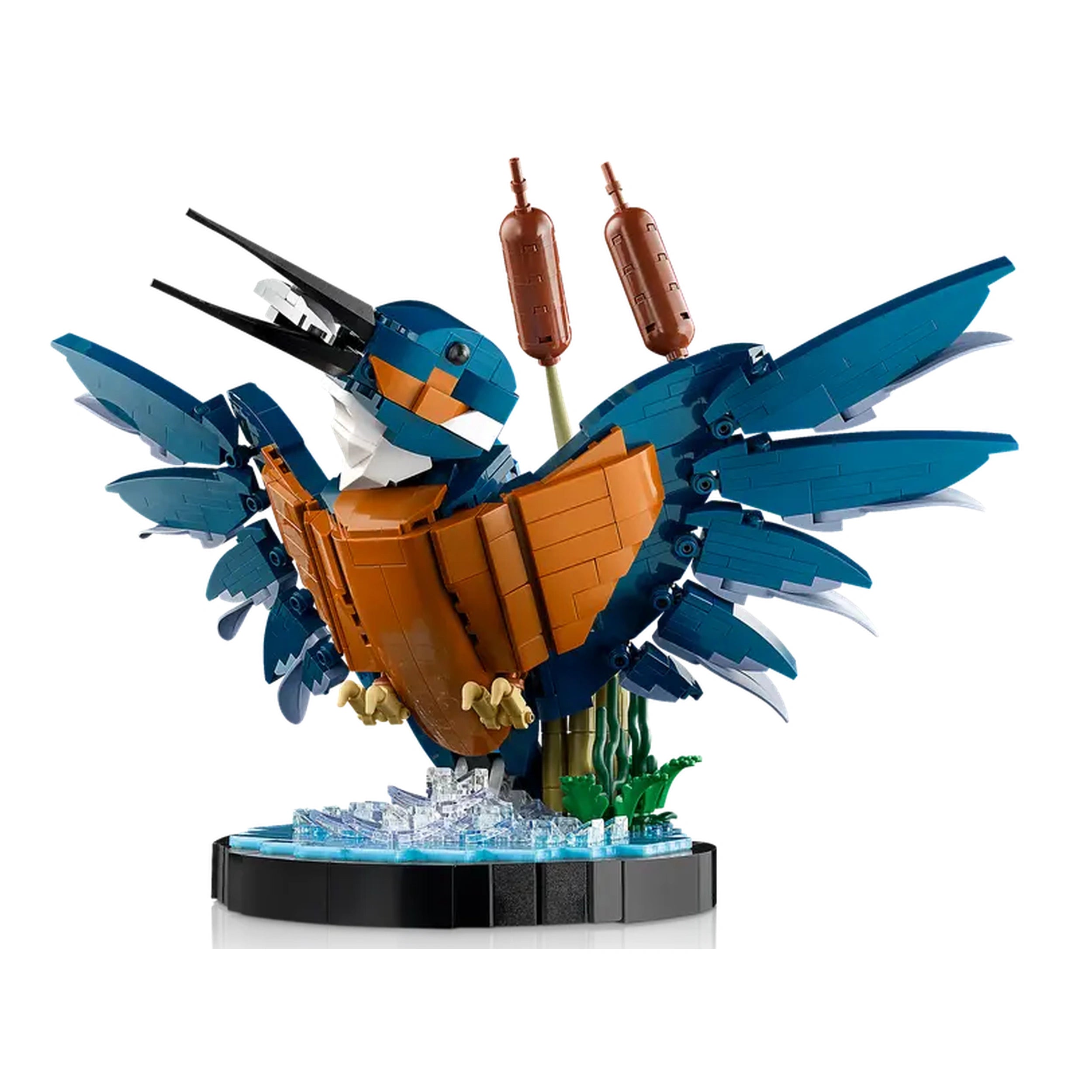 A vibrant LEGO® model of a kingfisher bird, with striking blue and orange plumage, perched amidst buildable reeds, over a stylized water setting.