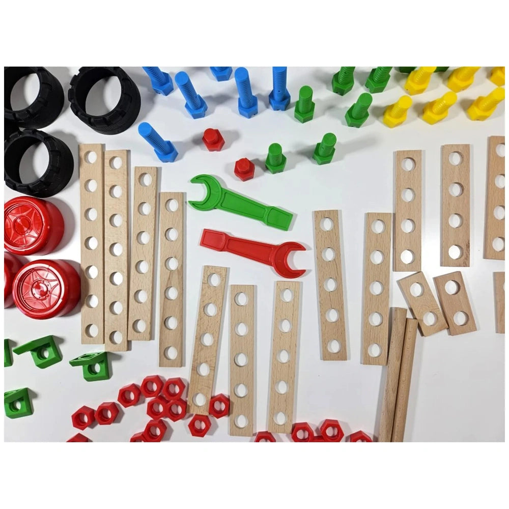 Wooden planks with holes, colorful screws, nuts, and toy wrenches for the Maly Constructor Junior Buggy Set.