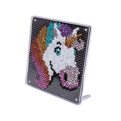 Ammirate unicorn-sequin art activity features a vibrant, multicolored design on a shiny, reflective rectangular surface.