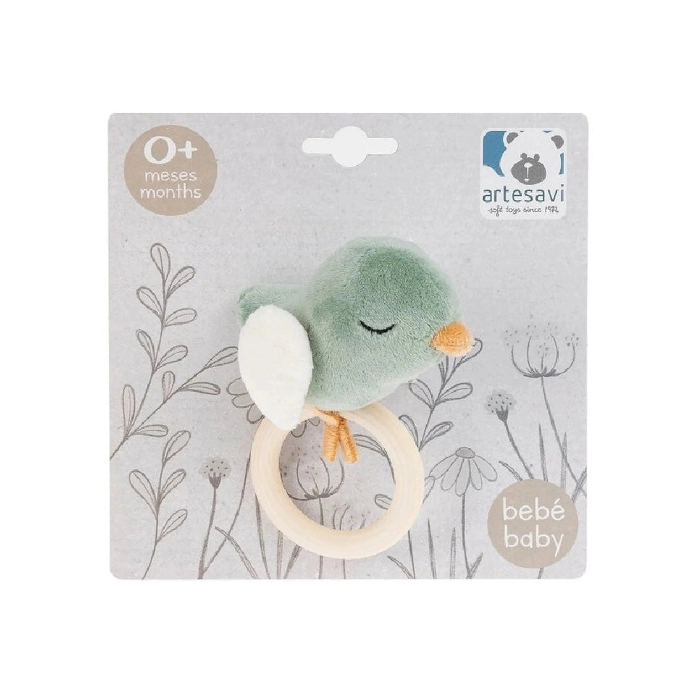 Soft green bird plush rattle with white wings and orange beak on decorative packaging, suitable for newborns.
