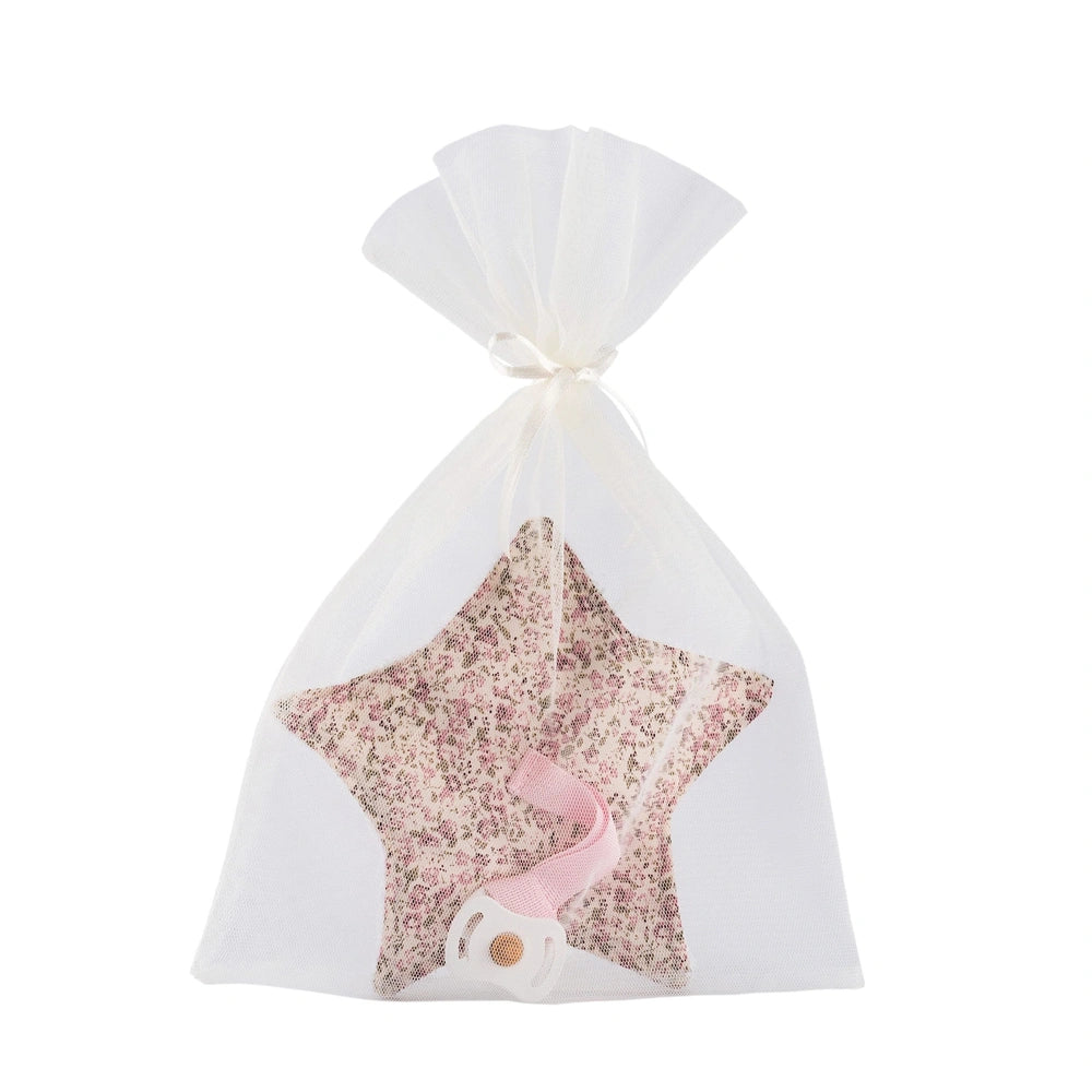 Floral star-shaped doudou with pink ribbon and pacifier in a sheer white organza bag.