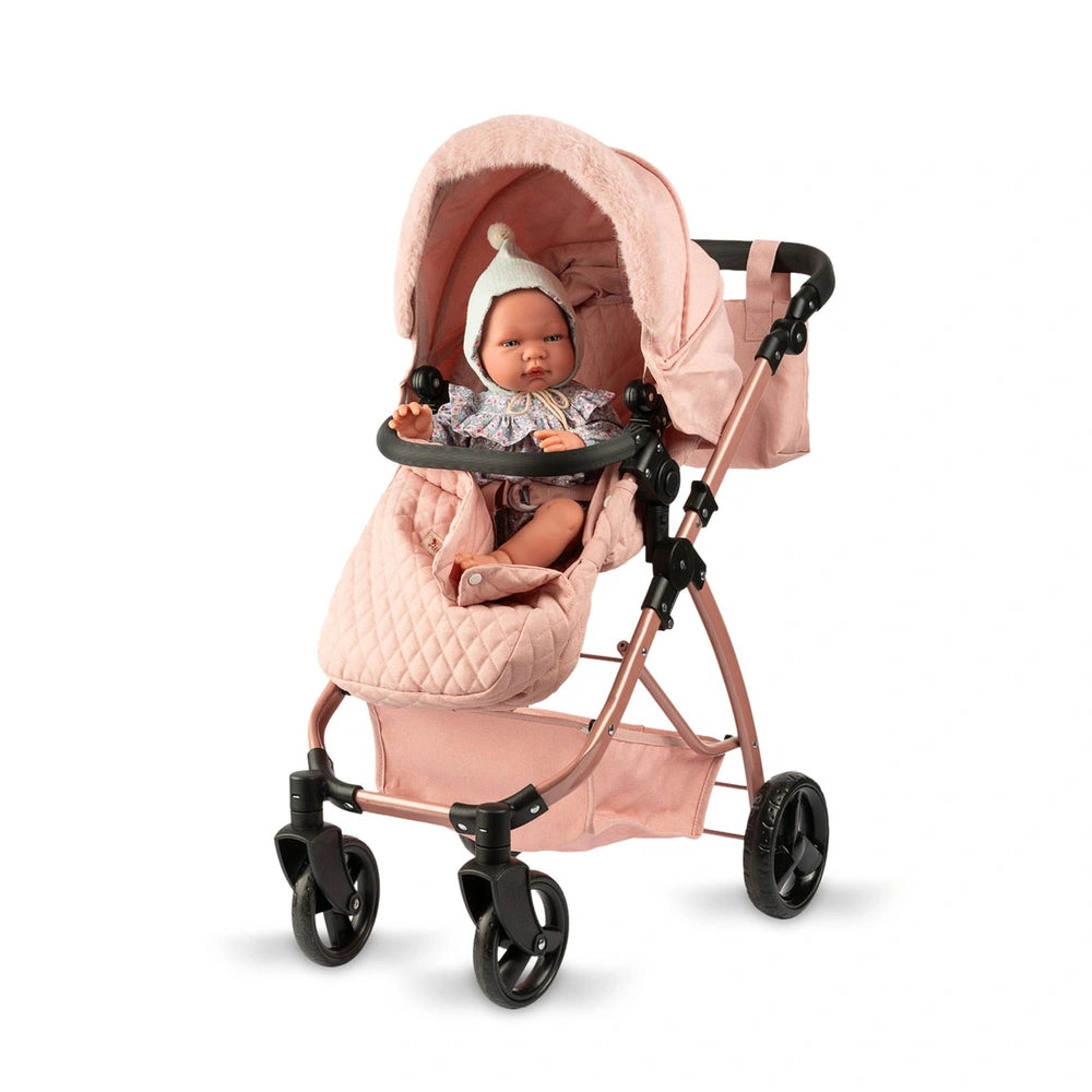 ASI Dolls Modern Mami 2 in 1 Stroller with pink canopy, doll inside, and four black wheels, set against a plain white backgro