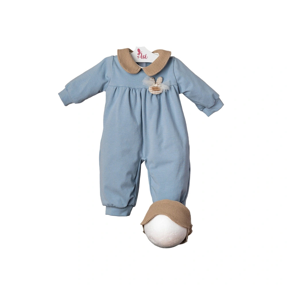 ASI Dolls outfit consists of a light blue onesie with collar and bow, paired with a light brown hat featuring a pom pom.