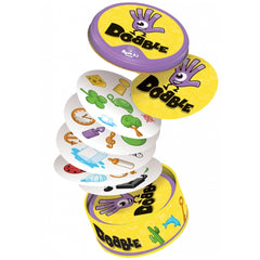 ASMODEE Dobble Find The Pair card game containers stacked, featuring playful purple design with yellow bases and cartoon hand graphic.