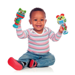 Baby Clementoni maracas in child's hands, colorful toys, joyful expression, wearing striped shirt and red shoes.
