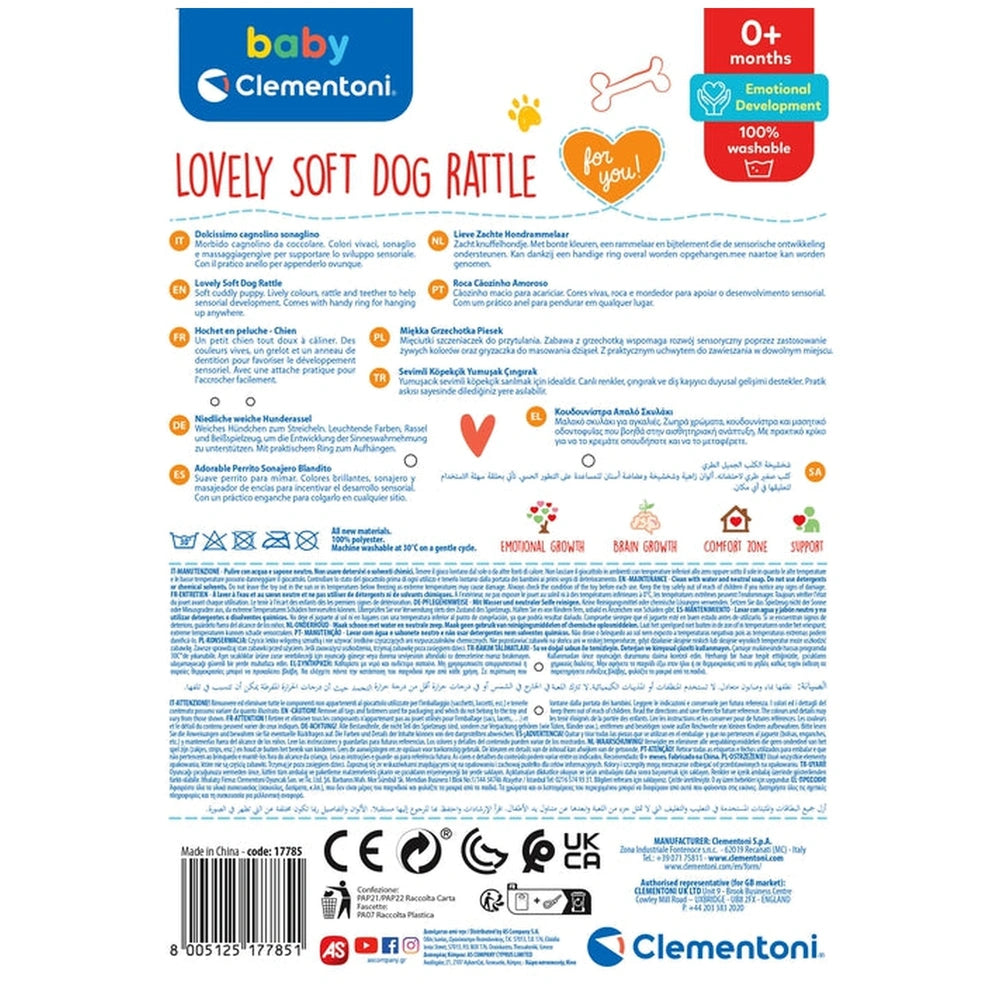 Baby Clementoni Lovely Soft Dog Rattle packaging features a clear plastic window and colorful printed text on glossy cardboar