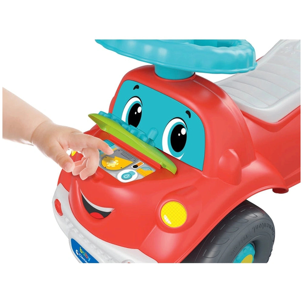 Baby Clementoni Nicolo Go Go 3 In 1 riding toy features a blue roof, red interior, green steering wheel, and yellow headlight