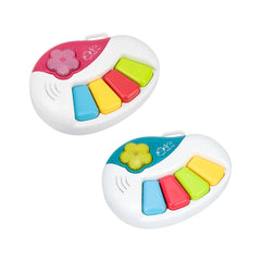 Baby Orchestra electronic piano keyboard toys in white with colorful accents, featuring a handle and a row of vibrant buttons