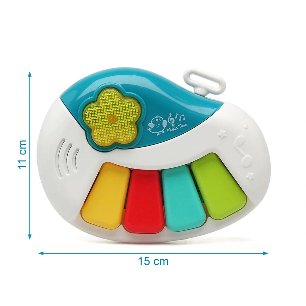 Baby Orchestra electronic piano keyboard features a smiling face design, colorful buttons, and a smooth plastic surface.
