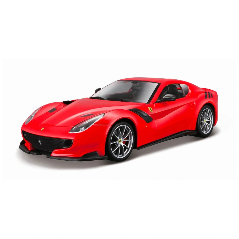 Ferrari Race Play 1:24 die cast vehicle featuring a red body, black bumpers, clear windows, and black rubber tires.