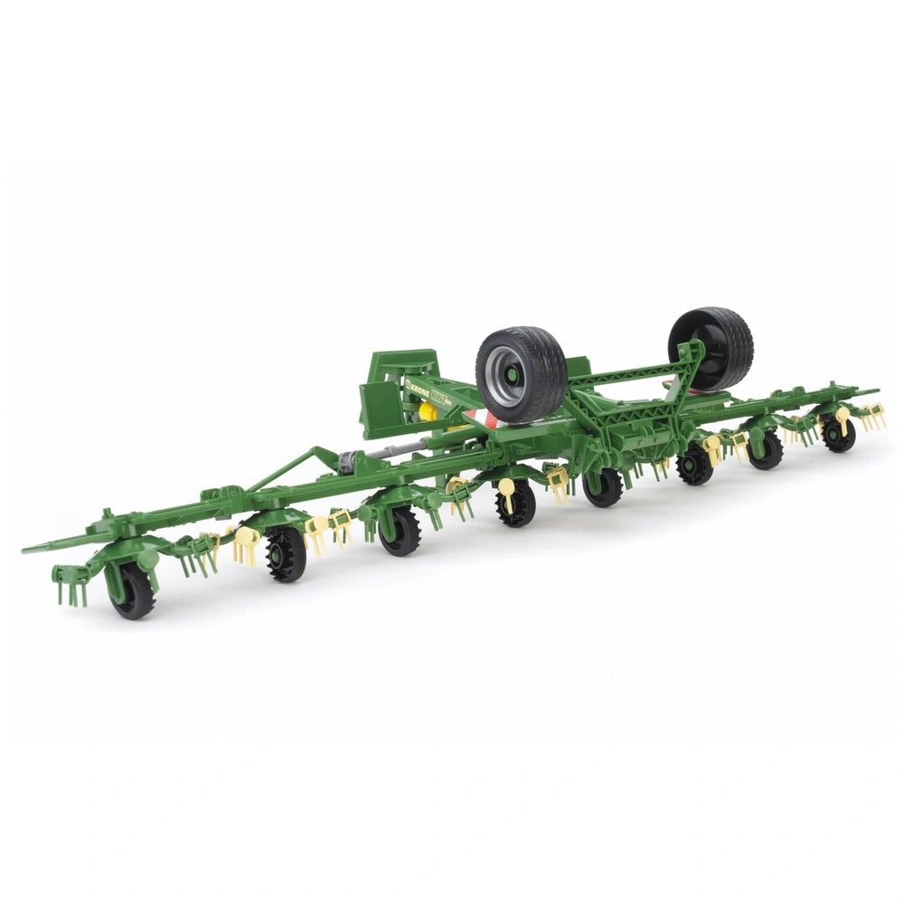 Green Bruder Krone Trailed Rotary Tedder toy with realistic rotary features and wheels, designed for farming play.