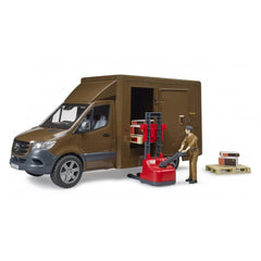 Brown UPS Sprinter toy with driver figure, red pallet jack, and delivery boxes on a wooden pallet.