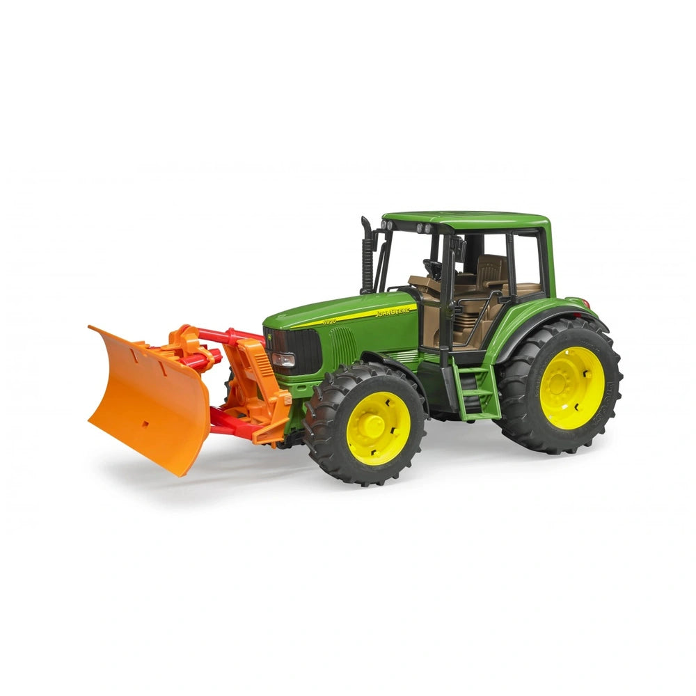 Green toy tractor with functional orange plow blade, designed for imaginative farming play. Suitable for children 3+.