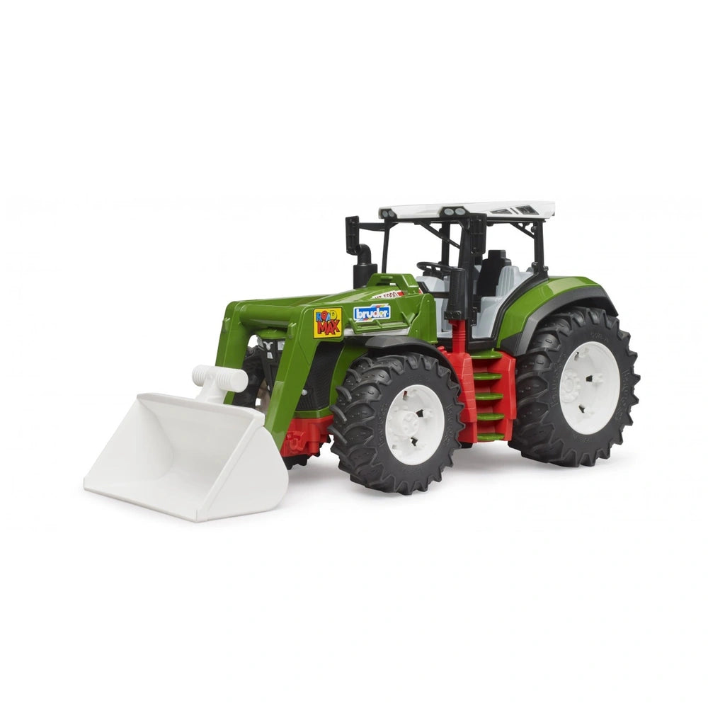 Green Bruder Roadmax tractor with frontloader, large tread tires, and detailed cab on a white background.