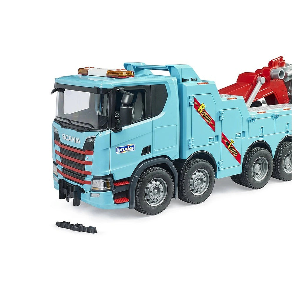 Blue Scania Super 560R toy tow truck with red accents and realistic details, featuring "Rescue Truck" branding.