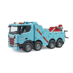 Light blue toy Scania Super 560R towing truck with red accents, six wheels, and realistic details for imaginative play.