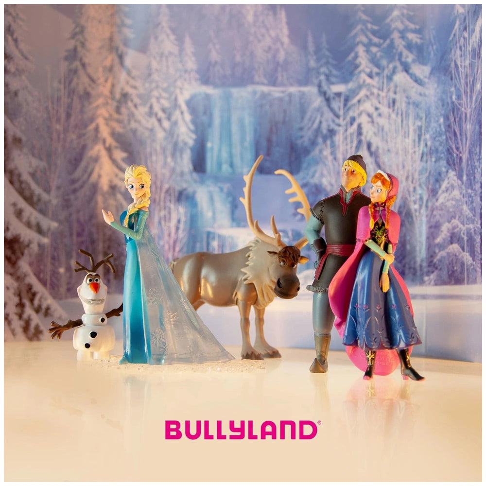 Bullyland Disney Anna toy figure stands 9.5 cm tall, surrounded by a plastic snowman, trees, and a blue waterfall scene.