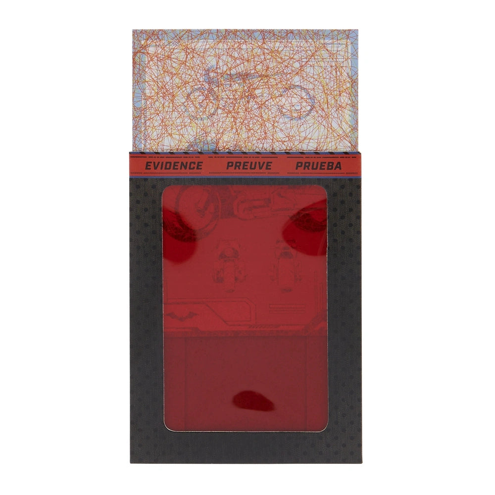 Batman Selina Kyle action figure stands at 10 cm, accompanied by three accessories and a mystery card, on a vibrant red backd