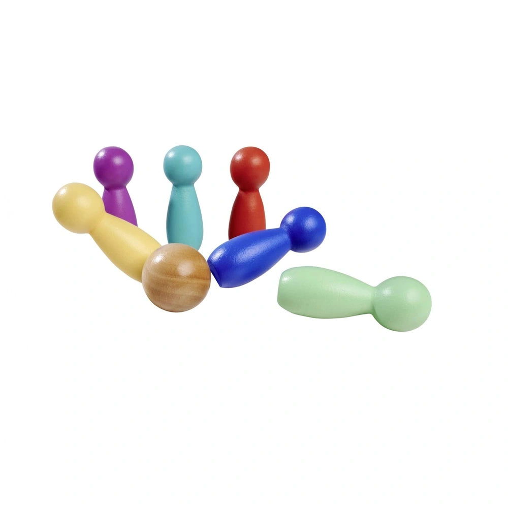 Eichhorn bowling game features colorful cylindrical pins in yellow, blue, red, and green arranged on a white background.