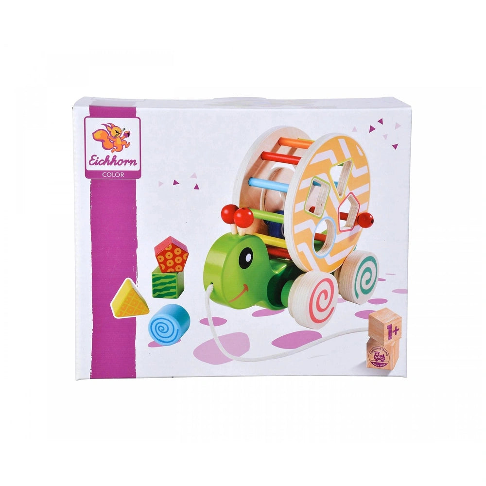Colorful Eichhorn toy box with a purple stripe, featuring playful designs and a logo, ideal for baby activity toys.