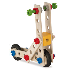 Eichhorn Constructor 4 in 1 is a wooden construction set featuring colorful plastic connectors and wheels for versatile assem
