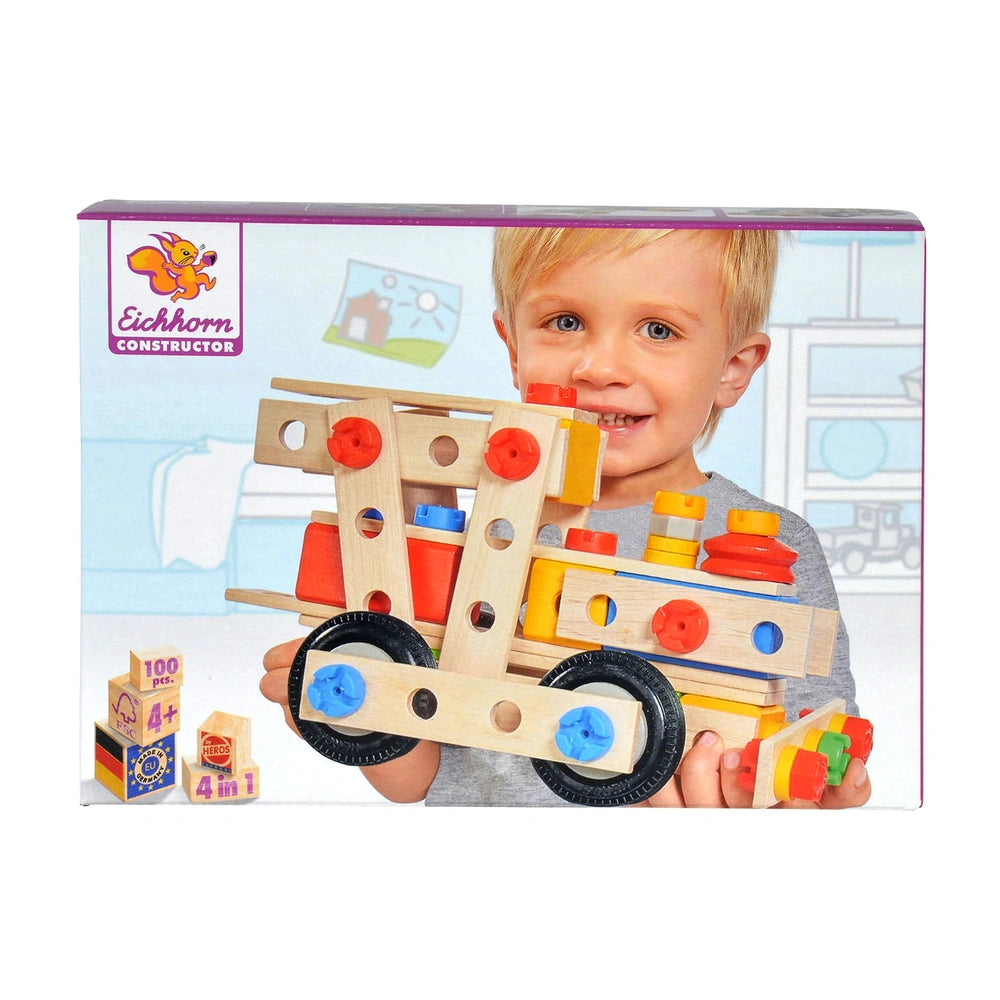 Eichhorn Constructor construction set with colorful wooden pieces held by a smiling child in a grey top against a light backd