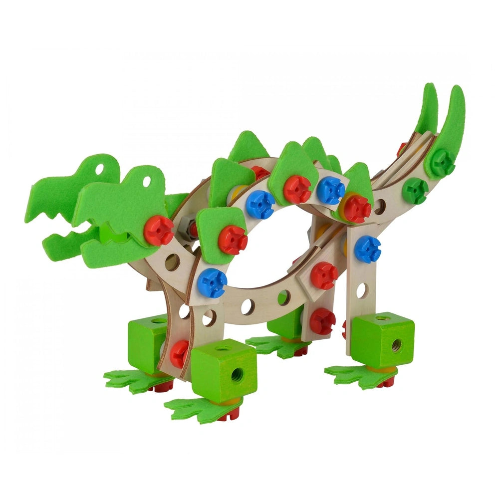 Eichhorn Constructor Dinosaur set features a stylized green crocodile with a brown snout and red tongue, standing on four leg