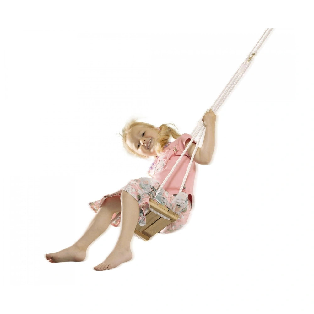 Eichhorn Outdoor Wooden Swing with a smiling girl in a pink dress, enjoying swinging against a plain white background.