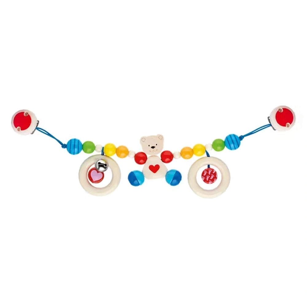 GOKI Stroller Chain Heart Bear features a white teddy bear design with red and blue elements, perfect for baby activity.