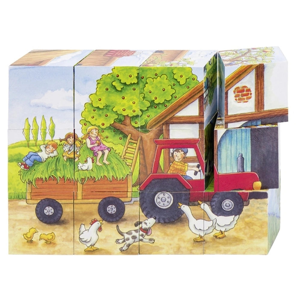 Gollness Cube Puzzle Seasons On The Farm features vibrant cardboard packaging with a family, farm animals, and a red truck il