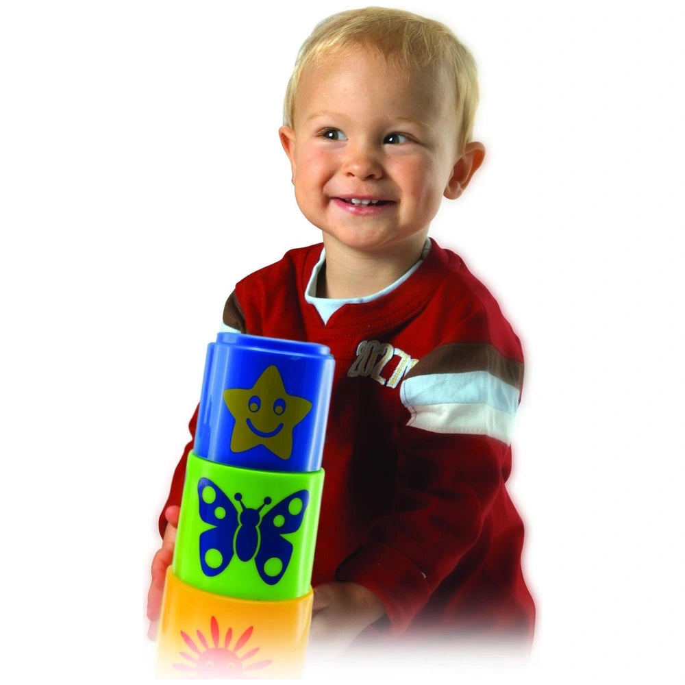 Gowi Box Bee sorting and stacking toys with colorful, glossy containers held by a smiling child in a red top.