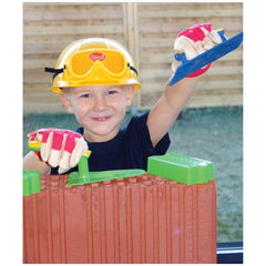 Gowi design bricklaying set features a boy in a yellow hard hat, holding a blue and red toy snowboard, with gloves and a blac