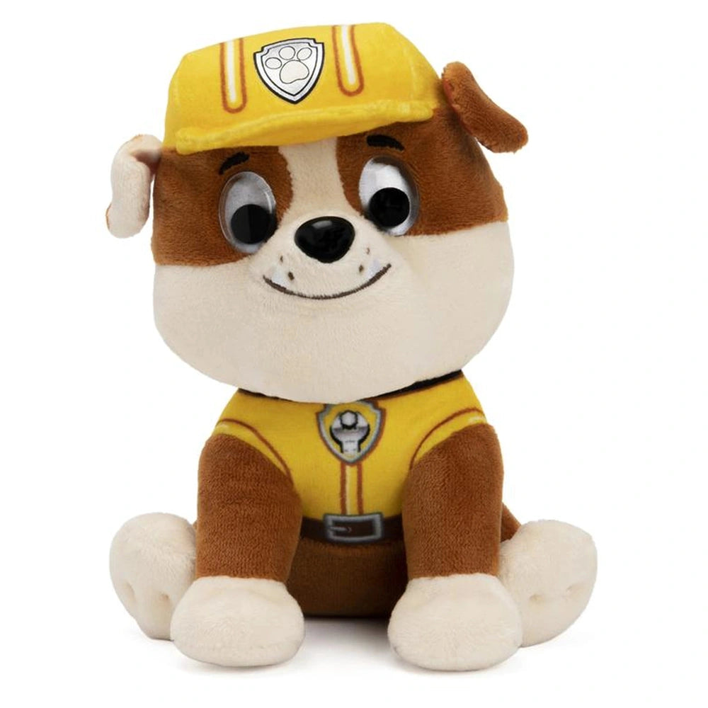 GUND PAW Patrol plush dog toy in a yellow construction outfit with a smiling face, brown and white fur, and a hard hat.