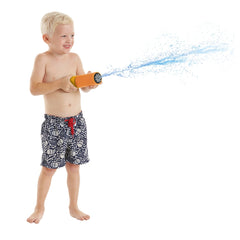 Happy People Foam Shooter Pocket Liquidator held by a smiling child with blonde hair, spraying blue water from an orange and 