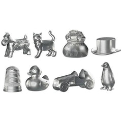 Monopoly Classic Italian Edition board game featuring silver dog, cat, car, top hat, and pepper grinder figurines.