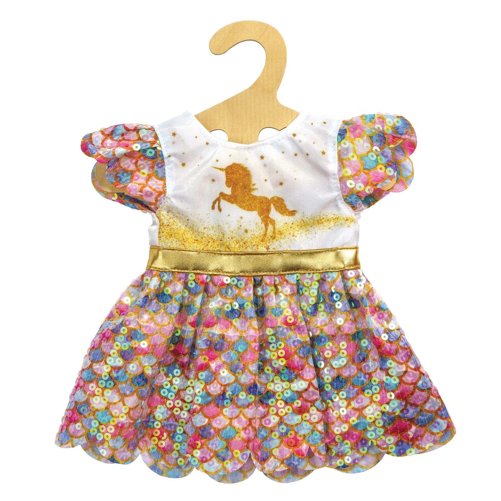 Glitter dress for dolls features a white top with unicorn graphic, colorful floral skirt, and shiny gold belt.