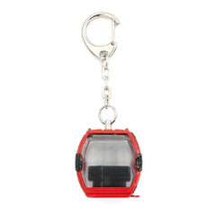 Red Omega IV gondola keychain featuring a metal ring and a black object inside a plastic casing.