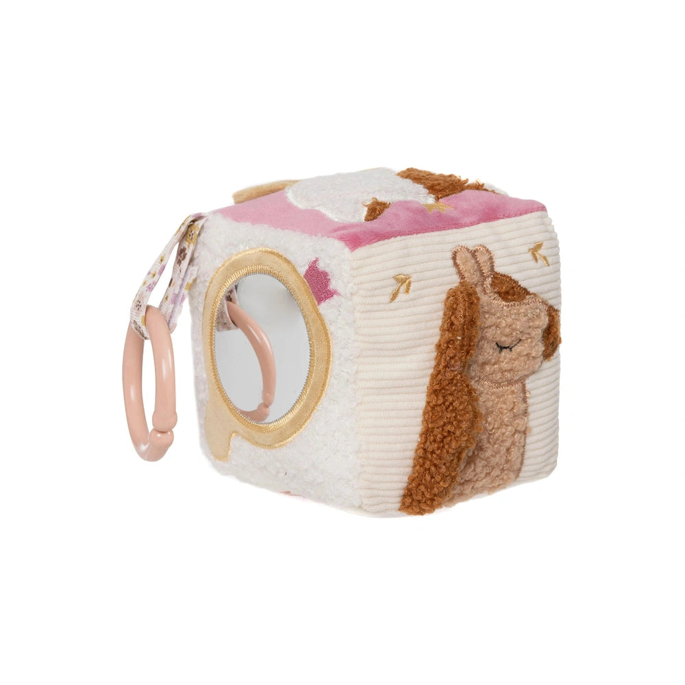 Jollein Activity Cube features a white fabric surface with pink and brown patterns, a gold mirror, and a flexible handle.