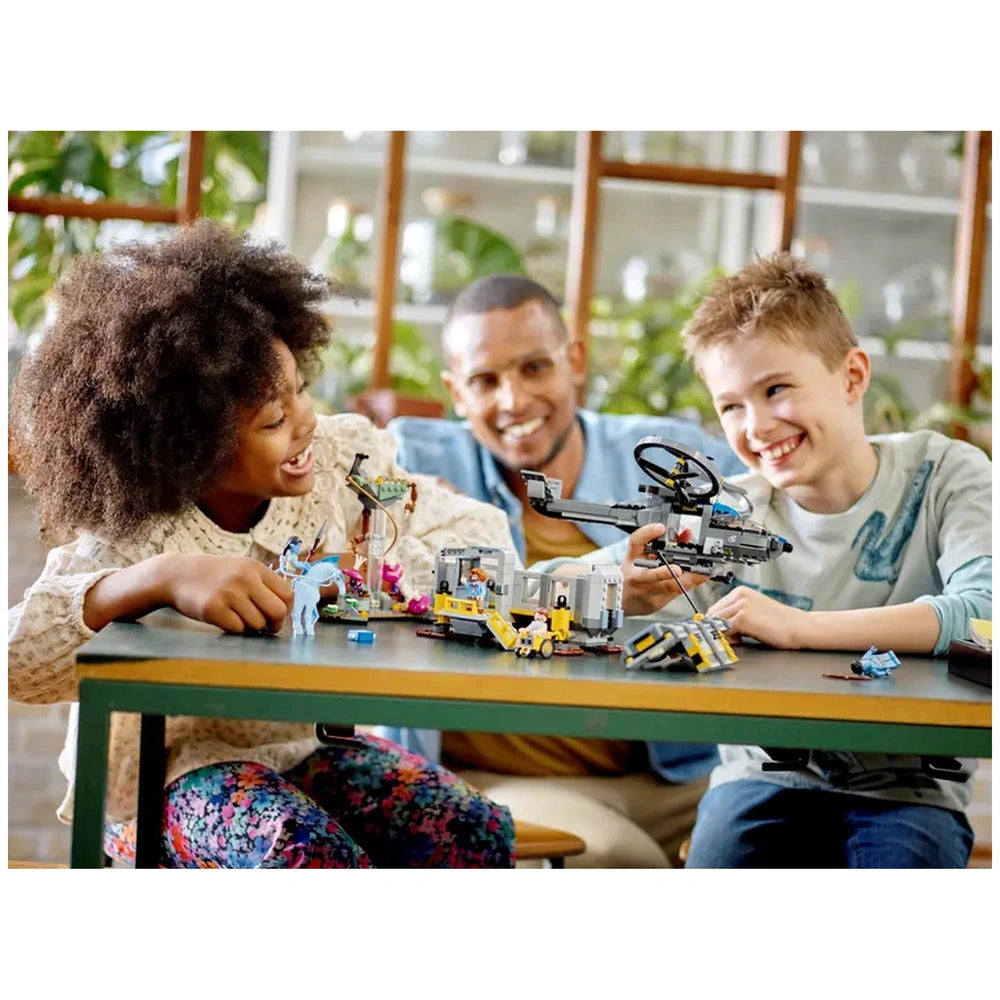 Lego - Avatar - Floating Mountains set displayed on a table as a family enjoys building together in a cozy indoor setting.