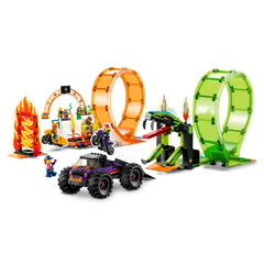 LEGO City Double Loop Stunt Arena featuring vibrant loops, flames, and props. Includes two stunt bikes, monster truck, and seven minifigures.