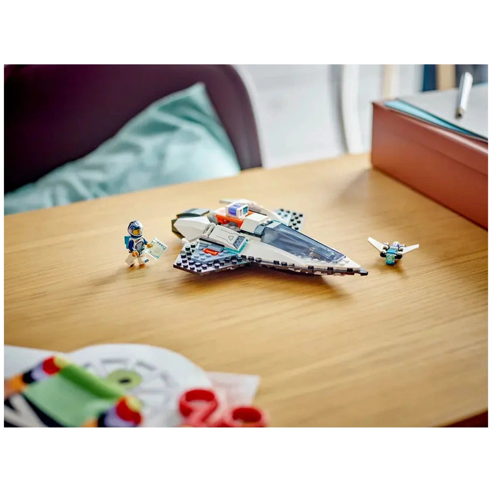 LEGO® City Interstellar Spaceship on a wooden table, alongside an astronaut minifigure and a small drone. A cozy background with soft, blurred colors.