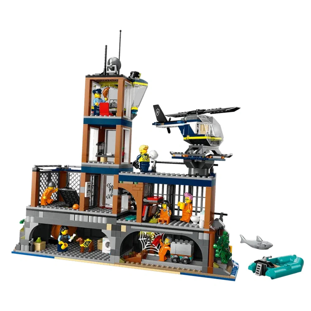 LEGO City Police Prison Island construction set featuring a detailed prison, helicopter, and multiple minifigures, including inmates and officers.