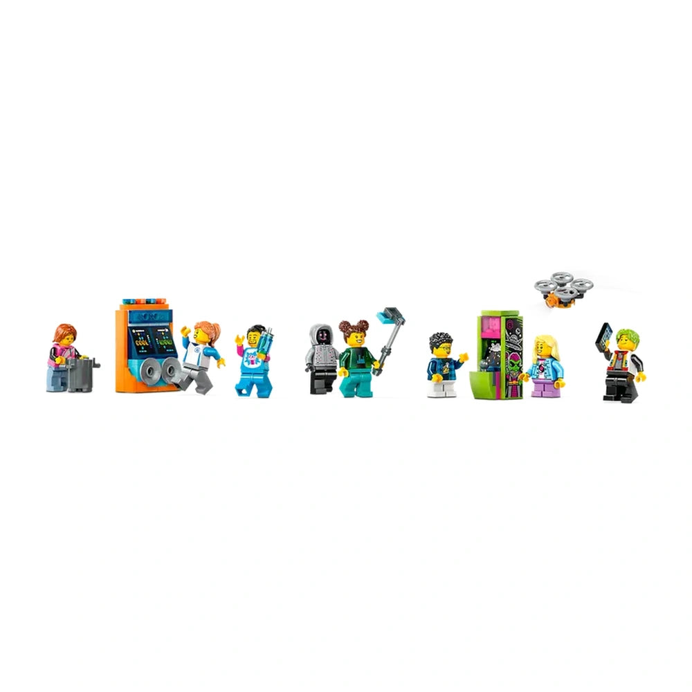 Colorful Lego minifigures line up, showcasing a variety of characters in fun poses. They include a girl with a suitcase, a boy with a futuristic gun, and a kid at an arcade machine. A drone hovers above, adding to the playful scene, perfect for imaginative play and storytelling.