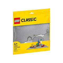 LEGO Classic Gray Baseplate (11024) in yellow packaging, showcasing a 48x48 stud base with colorful building blocks and scenes.