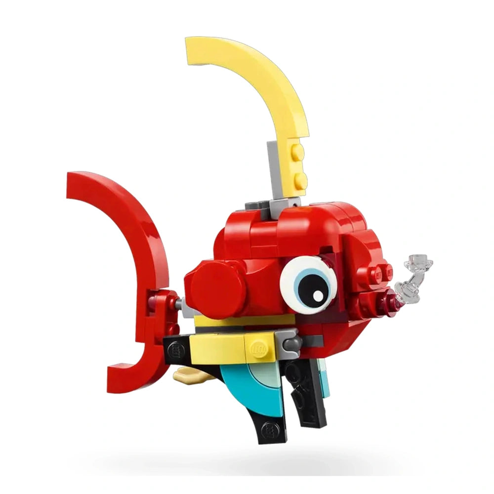 Colorful LEGO Creator Red Dragon with big eyes, yellow horns, and posable limbs, designed for imaginative play and creativity.