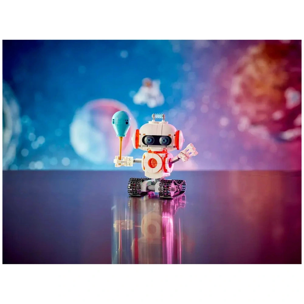 A colorful LEGO® Creator 3in1 Space Robot stands on a reflective surface, holding a blue object. The background features a vibrant space scene with planets and stars, enhancing the imaginative feel of intergalactic adventures.