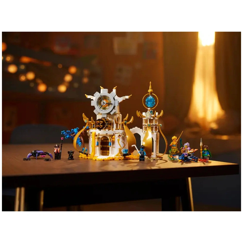 LEGO® DREAMZzz™ The Sandman's Tower set on a wooden table, featuring a white and gold castle, detailed characters, and accessories.