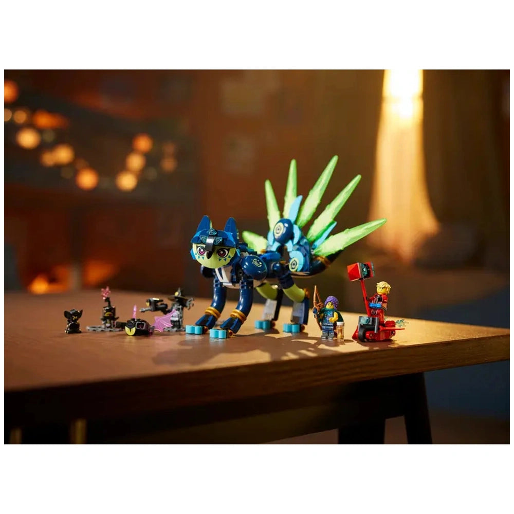 Colorful LEGO® DREAMZzz™ set featuring Zoey and Zian the Cat-Owl in blue and green, surrounded by playful accessories and figures.
