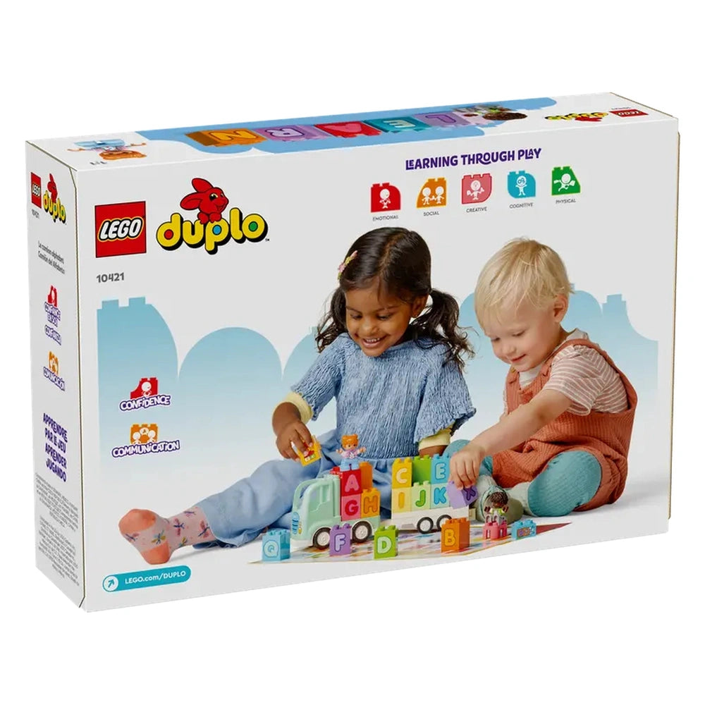Two children playing with the LEGO® DUPLO® Alphabet Truck, surrounded by colorful letter blocks, engaged in joyful learning.